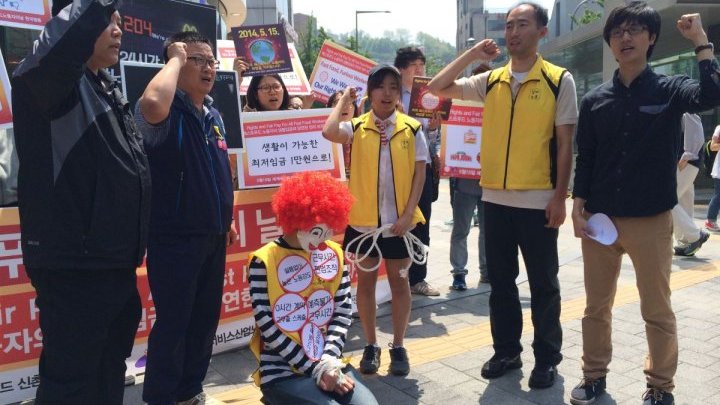 ‘Do you want fries with those poverty wages?' Global fast food workers strike out
