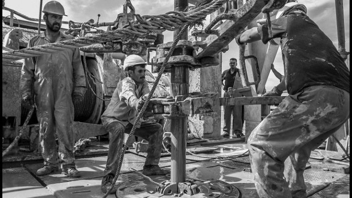 Les visages des travailleurs du pétrole irakien, tant convoité par l'Amérique